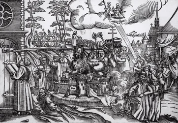 Martin Luther (1483-1546) schreibt 1517 an die Kirchentür in Wittenberg